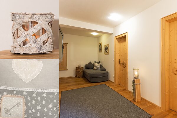 Gemütlicher Flur der Ferienwohnung Reifhorn mit Sessel, Holztüren und liebevollen Details.